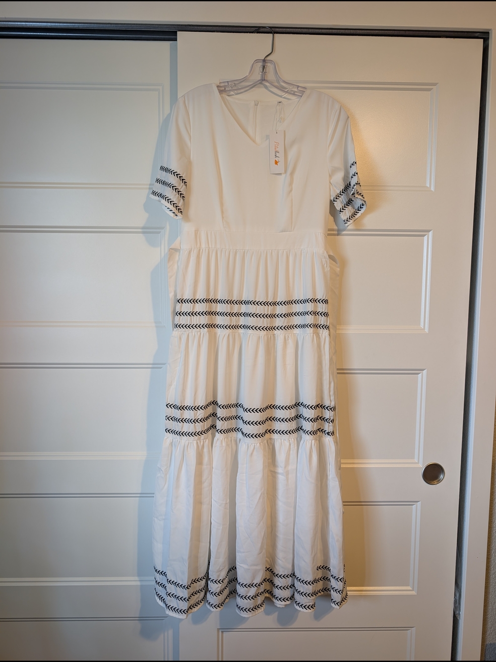 Petallush Cream V-Neck Dress with Gold Tag Accent
